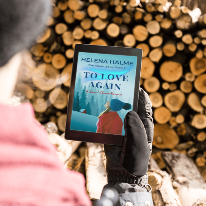 Person holding a tablet with 'To Love Again' by Helena Halme against a wooden log background